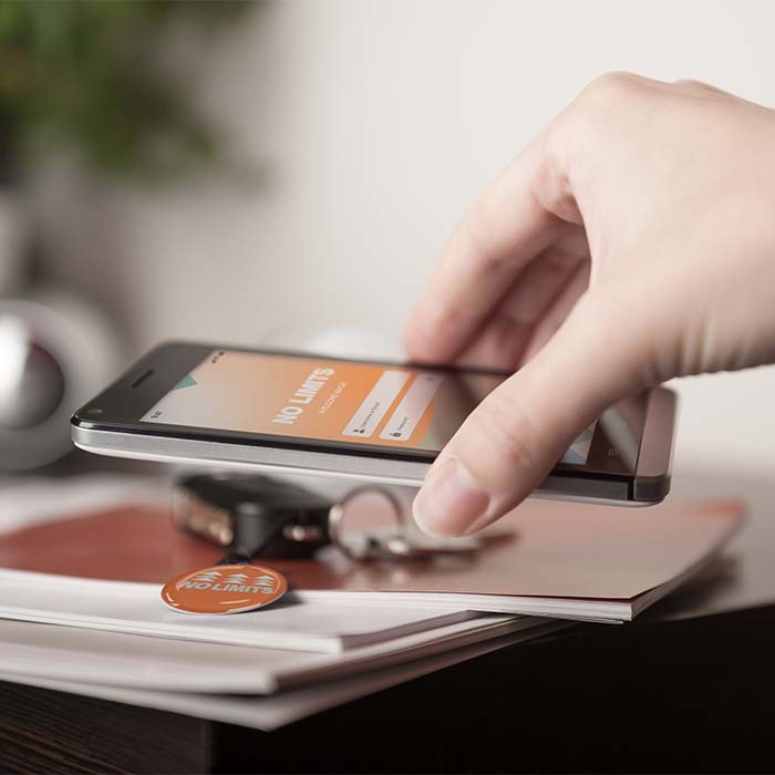 Ronde voorgeprogrammeerde NFC-sleutelhanger met doming.